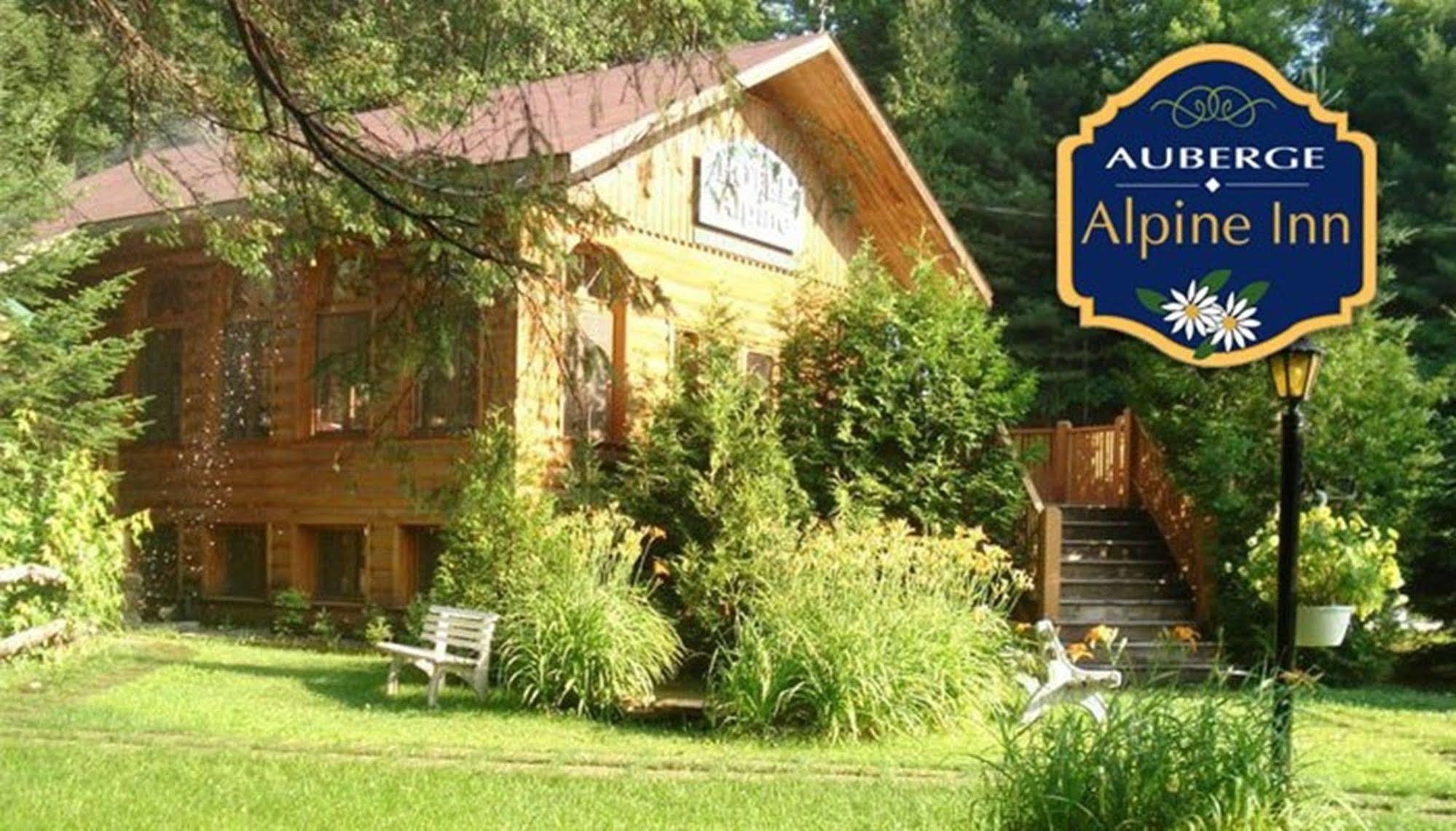 Auberge Alpine Inn Sainte-Adele Exterior photo